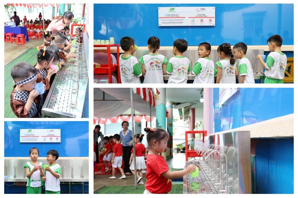 Children at An Dien kindergarten enjoy the fresh water from the program